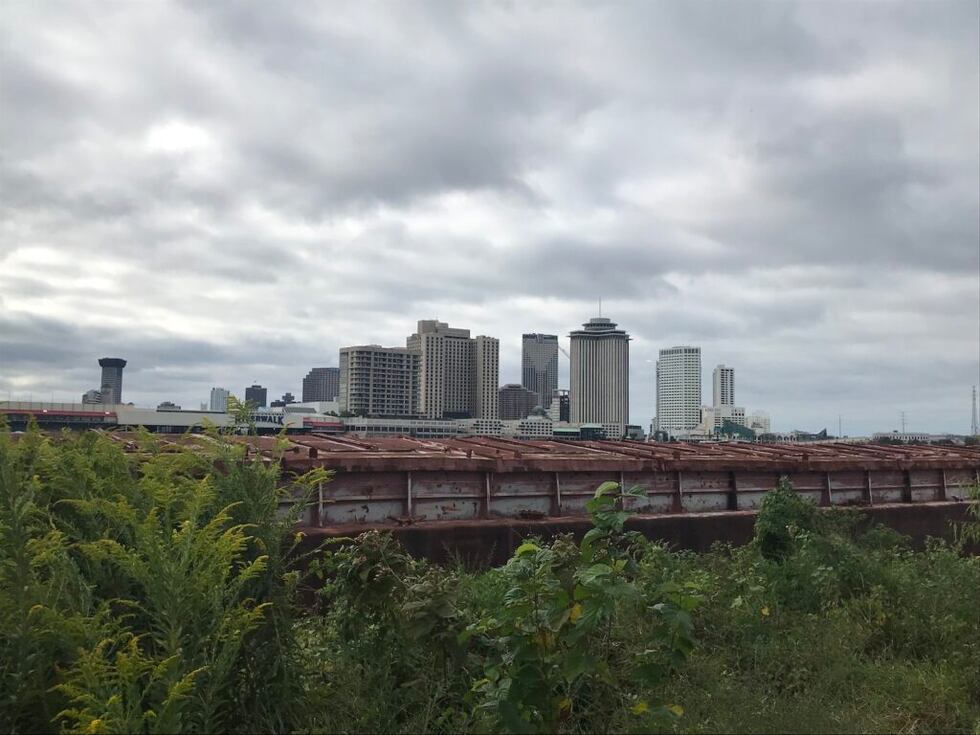 A barge is moored just downriver from the lone working water intake for the New Orleans west...