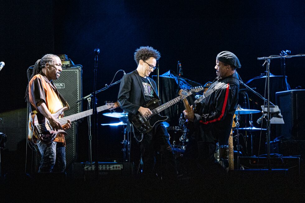 Nick Daniels, from left, Ian Neville and Tony Hall of Dumpstaphunk perform before The Rolling...
