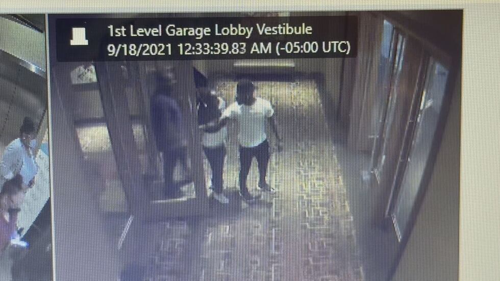 Jones holding the door for Johnson.