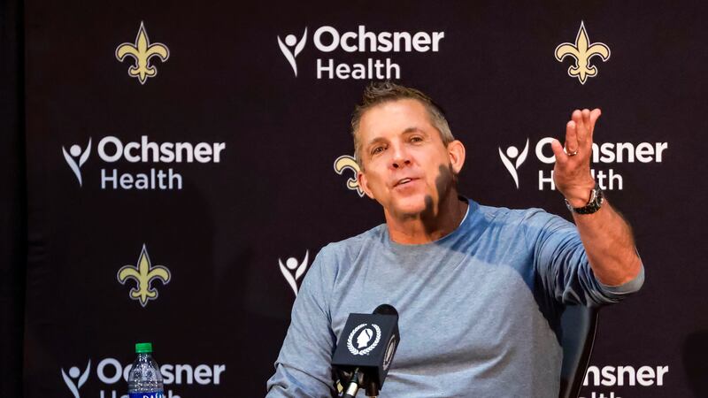 Sean Payton gestures during an NFL football press conference announcing his resignation as...