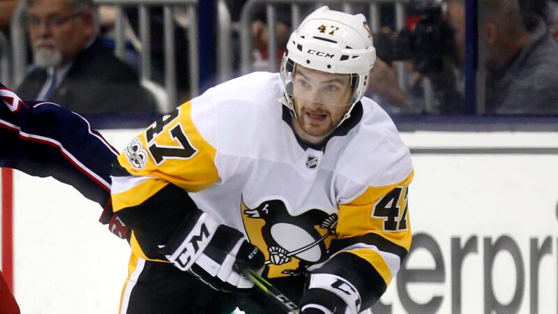 FILE - Pittsburgh Penguins forward Adam Johnson in action during an NHL hockey game in...