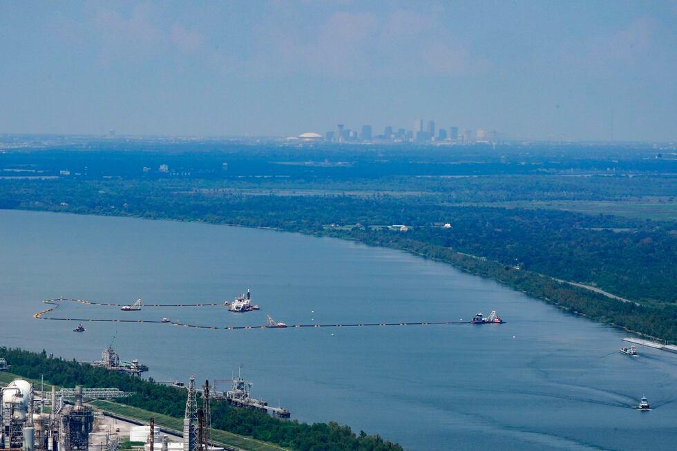 FILE - In this aerial photo, dredging operations to build an underwater sill are seen, with...