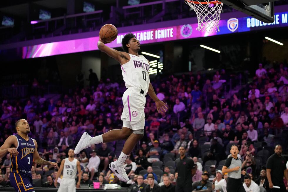 FILE - NBA G League Ignite's Scoot Henderson dunks against Boulogne-Levallois Metropolitans 92...